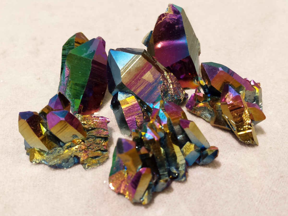 types of treated quartz - rainbow solar aura quartz gemstone