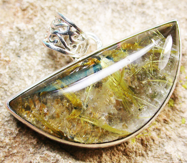 rutile in quartz gemstone pendant