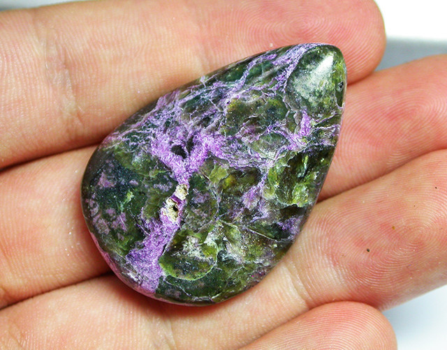 Purple and green gemstone on sale name