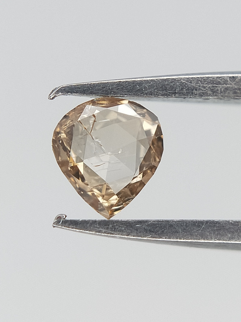 0.06 CT , Pear Modified Brilliant Cut Diamond , Brown