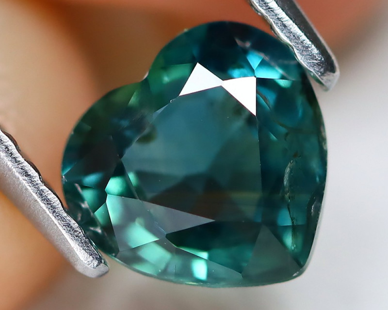 green blue teal sapphire gemstone - mermaid or peacock sapphire