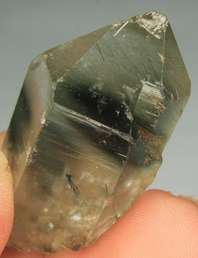 green actinolite in quartz crystal rough