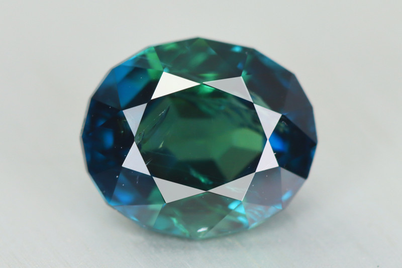 teal blue green sapphire gemstone - mermaid or peacock sapphire