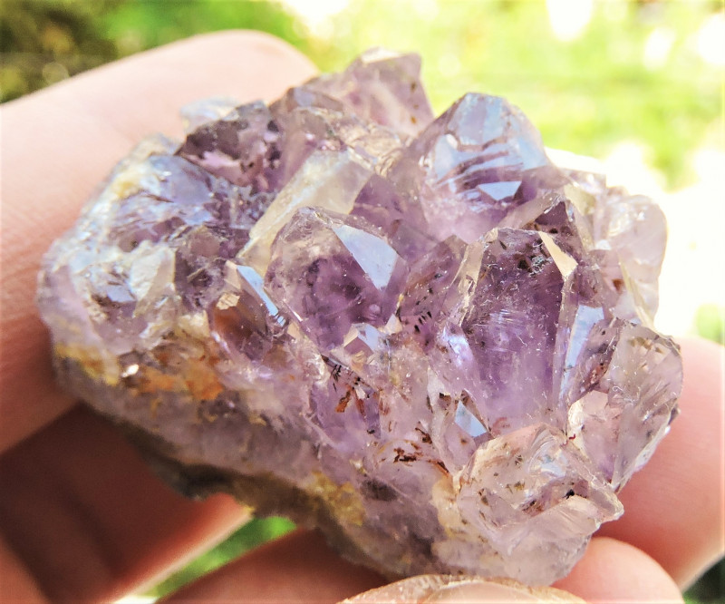 goethite inclusions in amethyst rough crystal