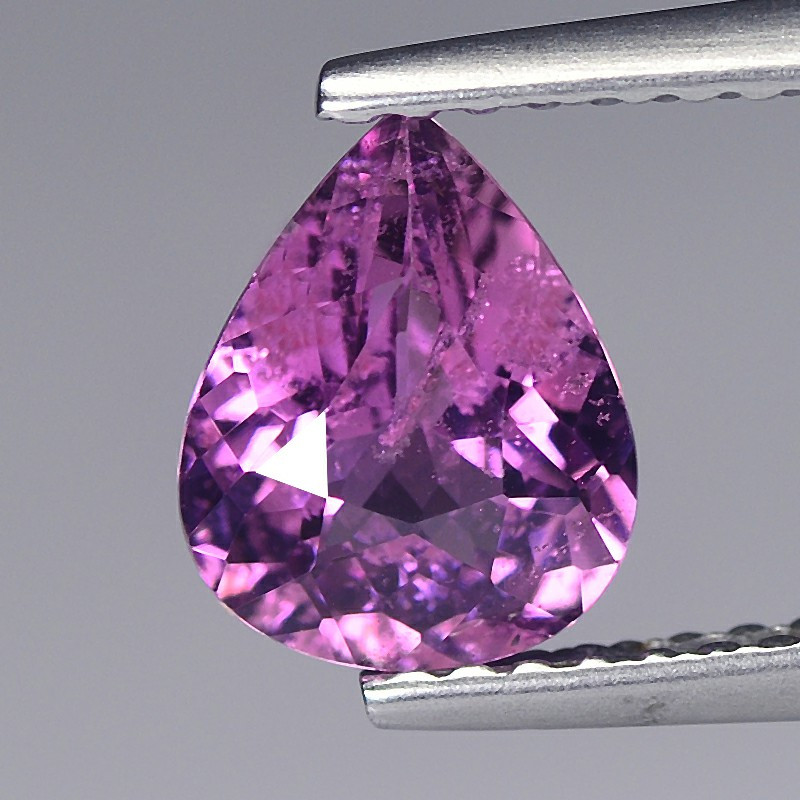 pinkish purple sapphire gemstone faceted