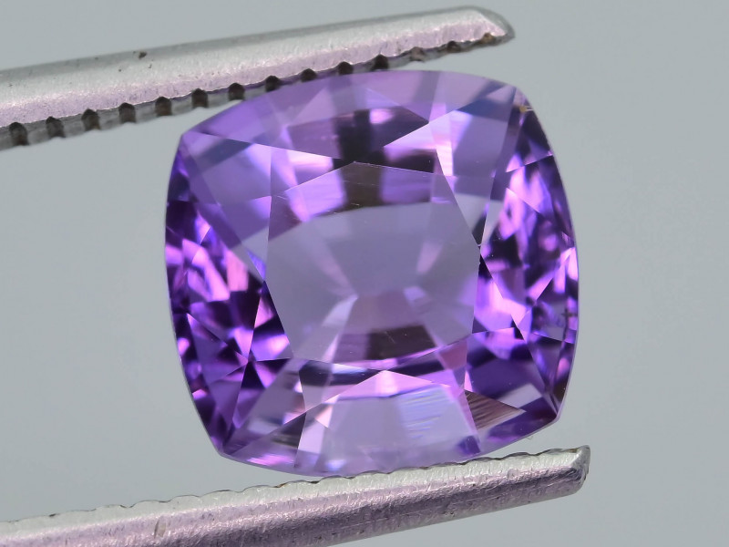 purple scapolite gemstone faceted