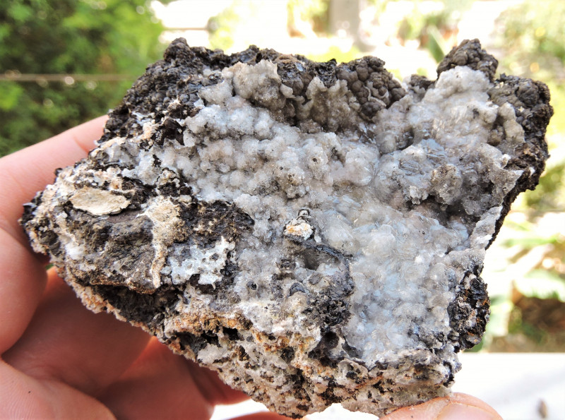 goethite gemstone rough with calcite