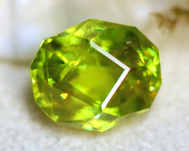 chartreuse green sphene gemstone faceted