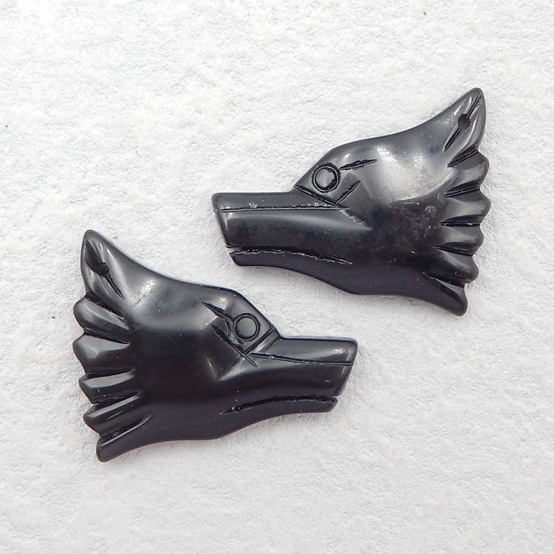 obsidian lava rock gemstone carving wolf heads