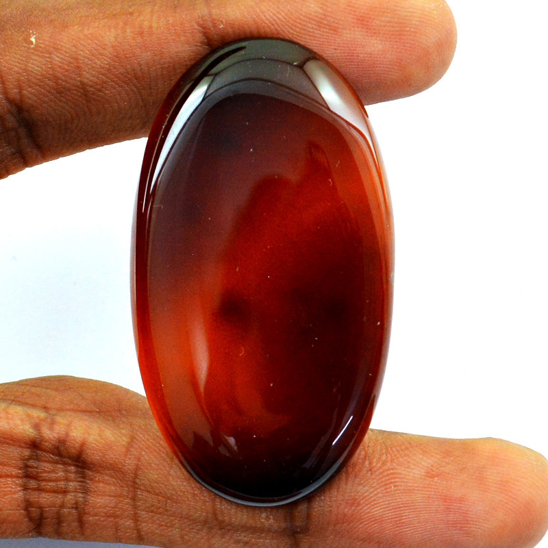 reddish black onyx gemstone cabochon