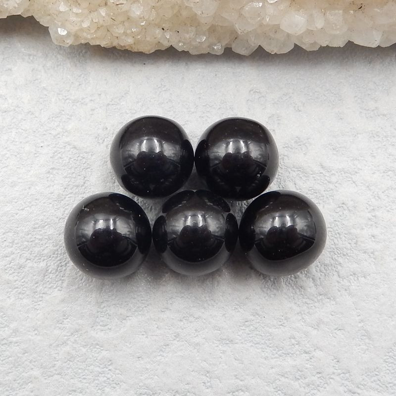 Deep deals black gemstone