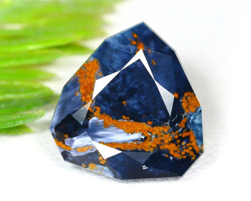 blue and orange pietersite gemstone faceted