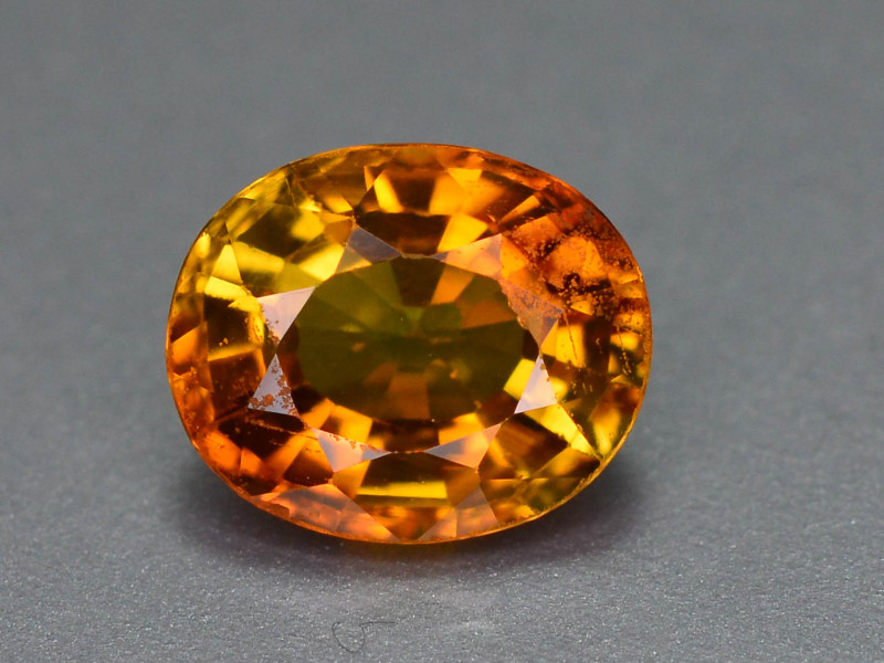 red and orange chrysoberyl gemstone faceted