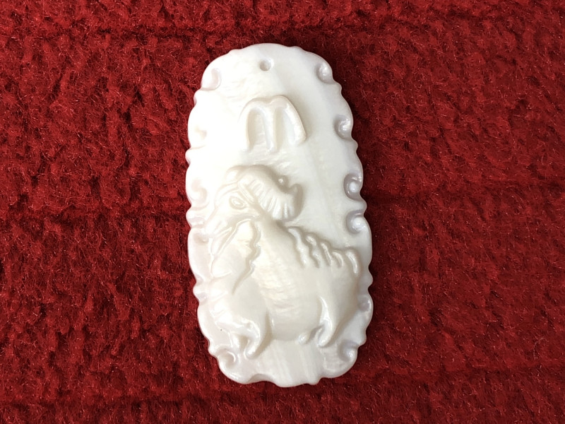 aries birthstones - pearl gemstone carving of ram