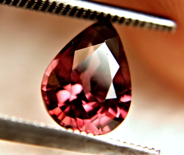 raspberry zircon faceted drop shape