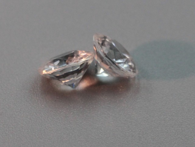 white zircon faceted pair