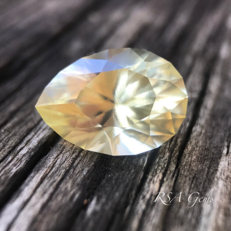 light yellow grossular garnet gemstone faceted