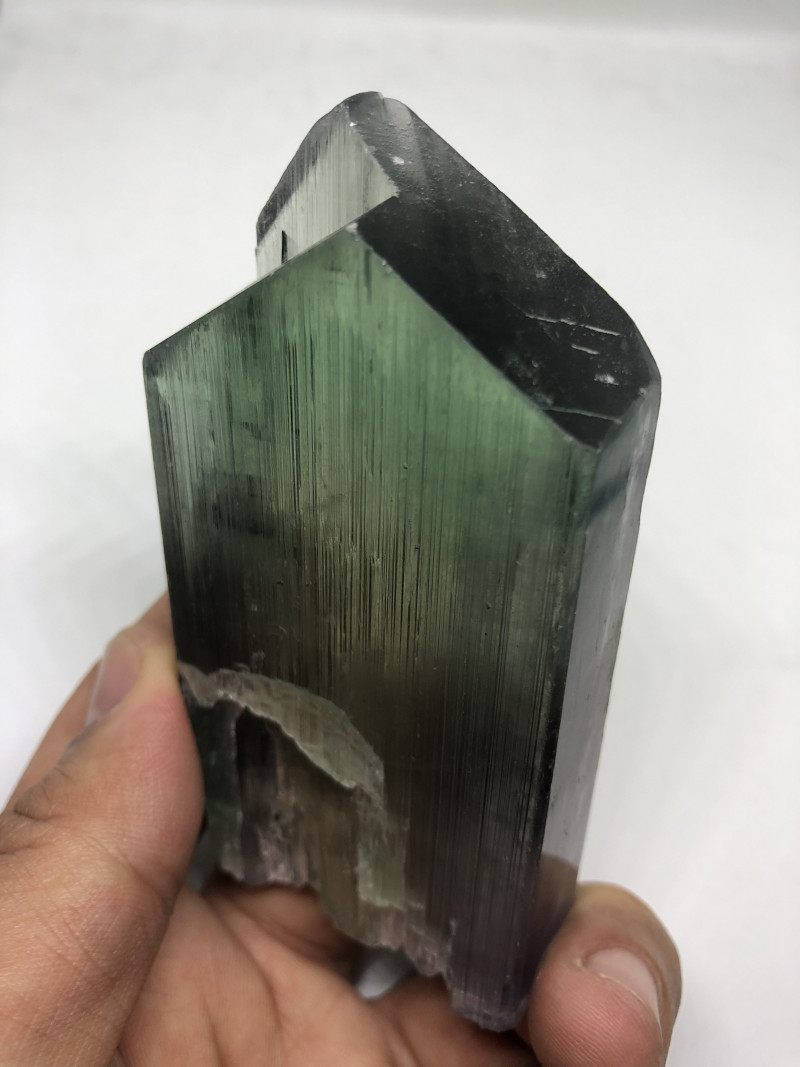 green spodumene gemstone rough crystal