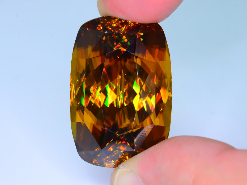 sphene gemstone faceted - rainbow dispersion