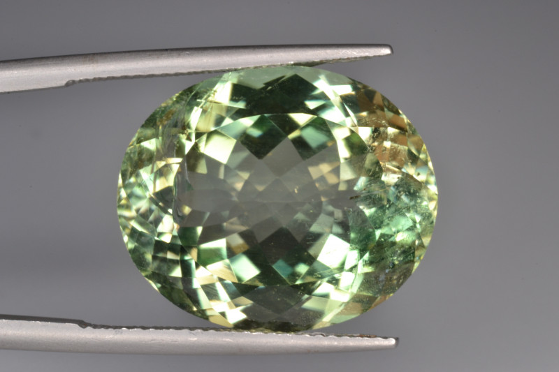 yellow-green euclase gemstone faceted