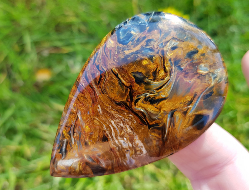 orange and blue pietersite cabochon drop