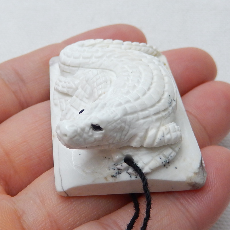 howlite carving of lizard for pendant