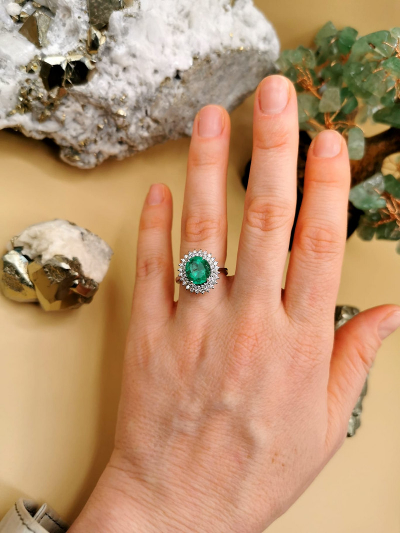 emerald green beryl gemstone ring with diamonds