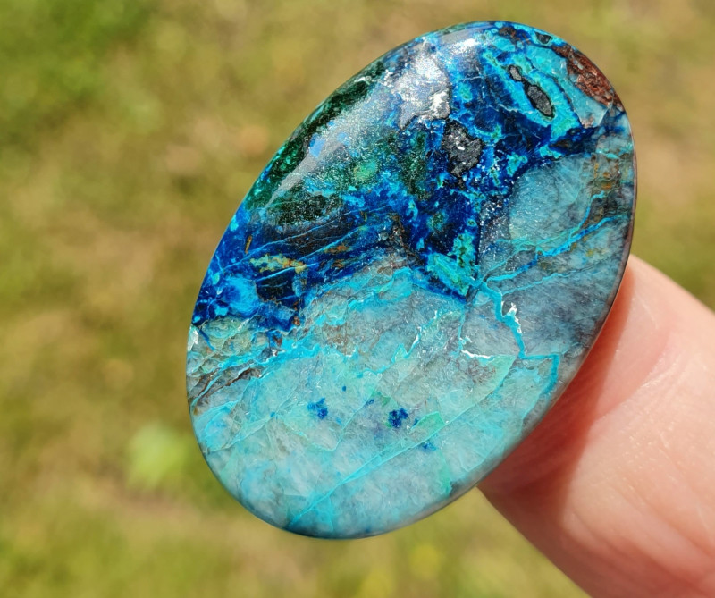 blue shattuckite gemstone cabochon with azurite, malachite, chrysocolla, and cuprite