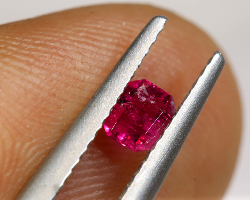 red beryl gemstone faceted