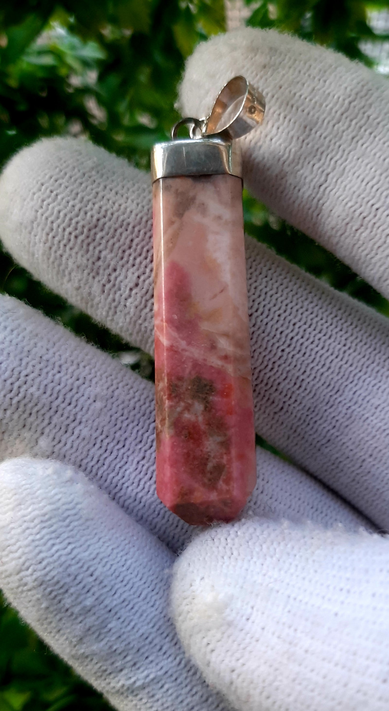 pink manganese brucite variety gemstone crystal pendant