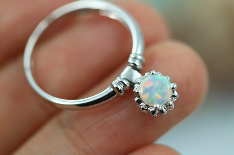 white gold ring with crystal opal