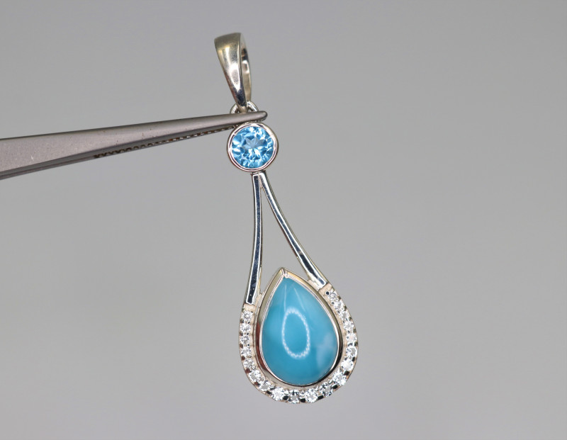 bright blue larimar gemstone pendant with blue topaz and cubic zirconia