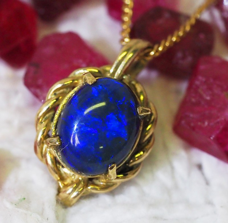 Solid Black Opal Set in 18K Yellow Gold Pendant SU660