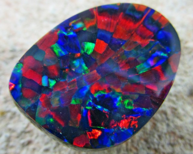 Harlequin pattern black fire opal