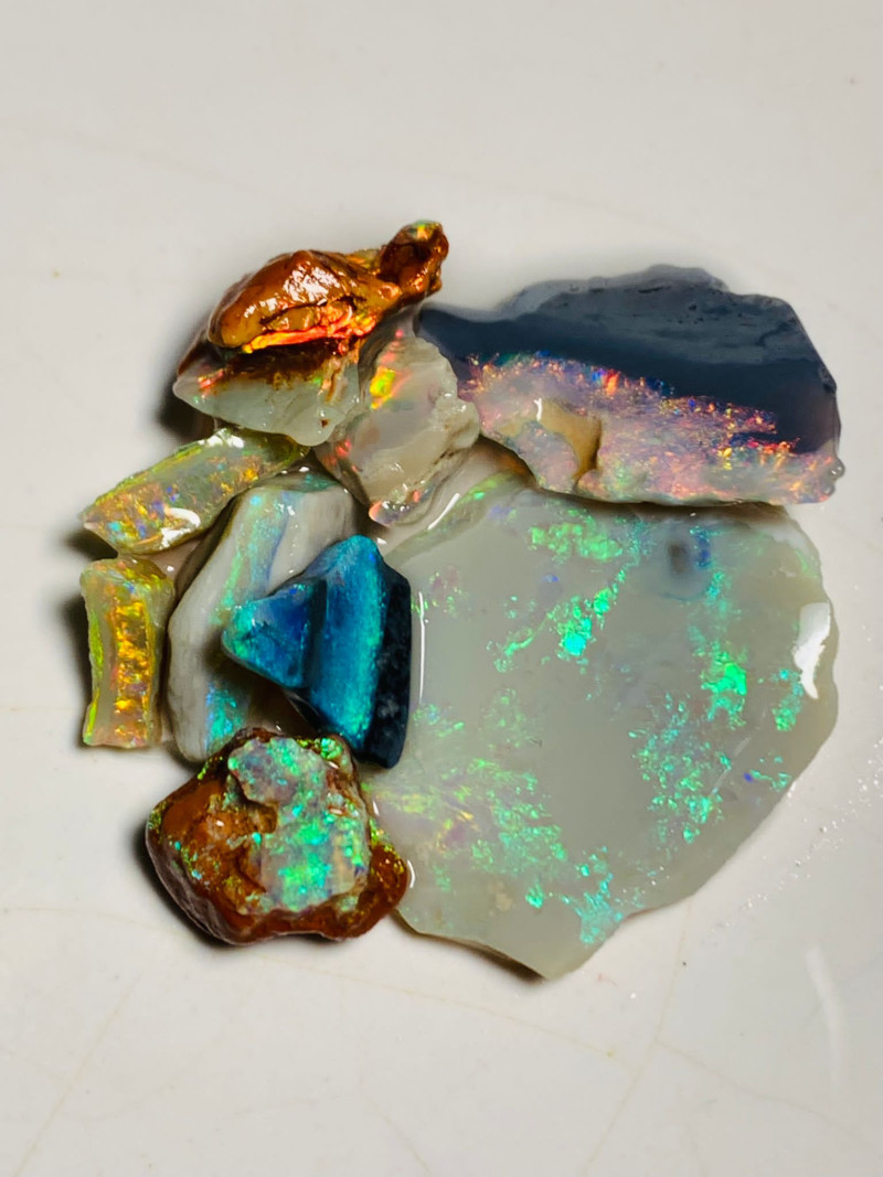 Plate of Colors* A nice selection of various multicolor rough opals to Cut