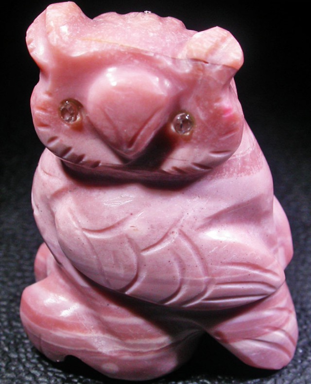 pink opal gemstone carving