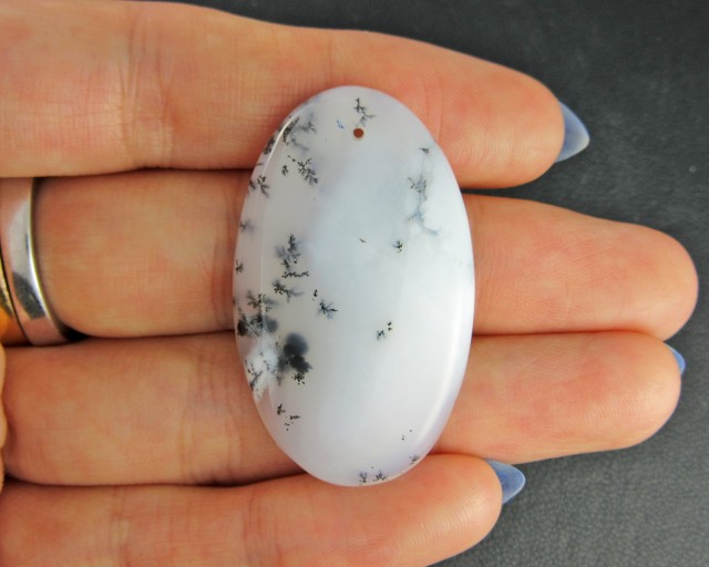 dendritic opal with hole drilled